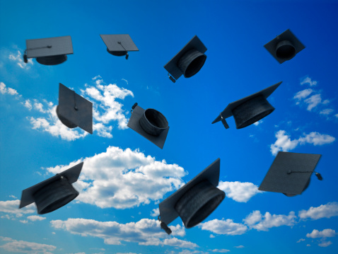 Graduation caps (mortar boards) against the sky. Blur effects added.Similar images: