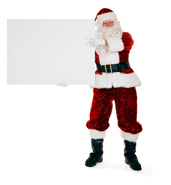 istock Santa Claus Holding a Blank Sign 174945464