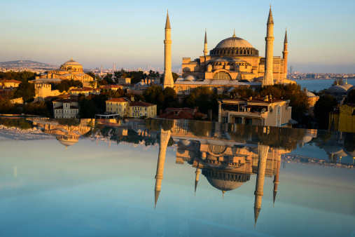 Hagia Sophia and Hagia Irene at sunset with reflection in horizontal orientation