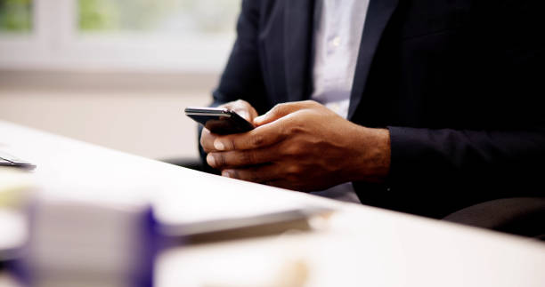 istock African Man Holding Smartphone 1749461325