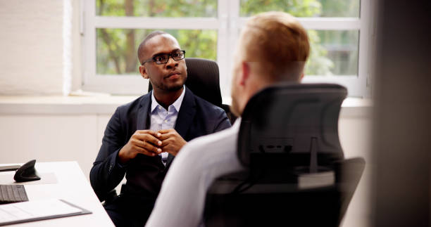 istock Two Businesspeople Talking With Each Other 1749461376