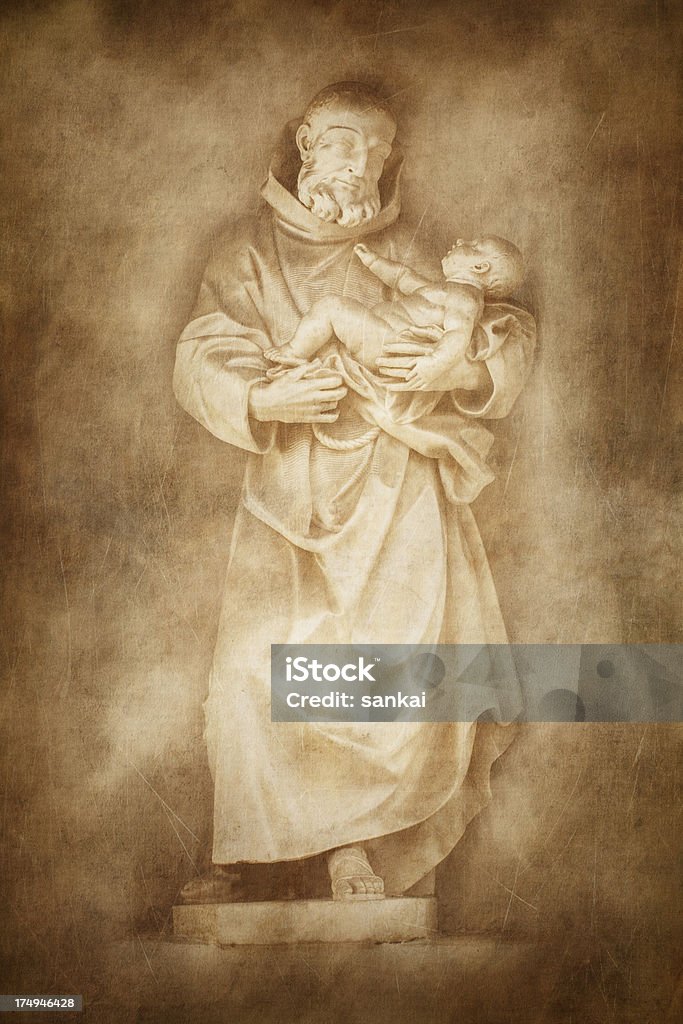 Monk hält ein baby in Ihren Armen - Lizenzfrei Alt Stock-Foto