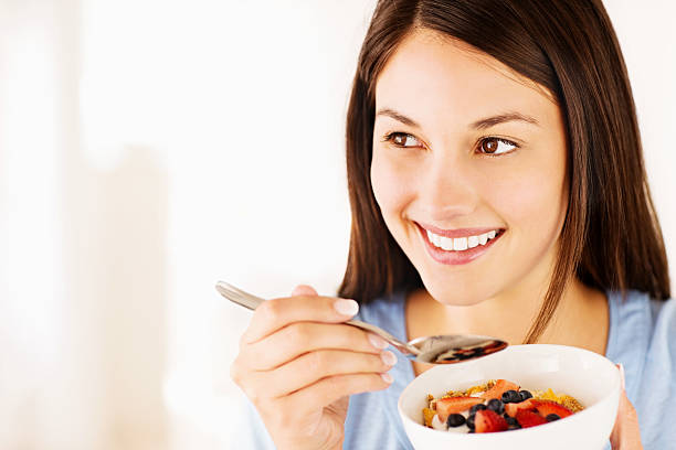 istock Female Having Muesli With Fresh Fruits 174946930