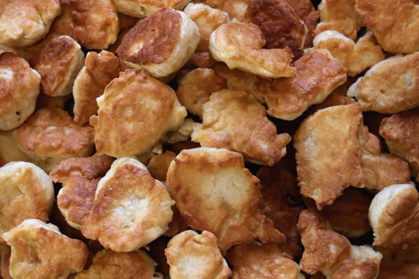 istock Many pancakes delicious background. Fresh fried crispy fritter muffins. 1749472598
