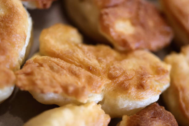 istock Many pancakes delicious background. Fresh fried crispy fritter muffins. 1749472704