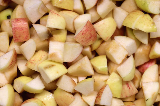 istock Many apple pieces prepared for the jam 1749474450