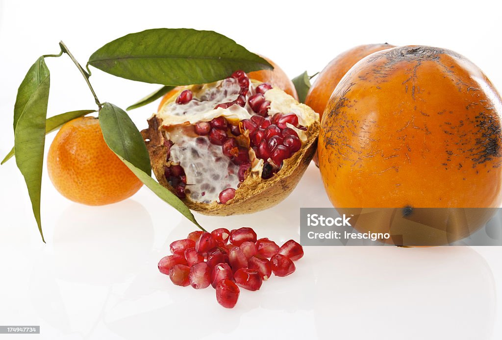 Melagrana -tangerines -khakis - Foto stock royalty-free di Alimentazione sana