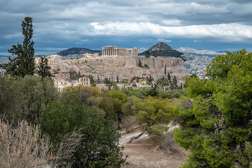 High angle view to the Stoa of Attalos Archeological Museum at Monastiraki square. A huge open air historical park with an old basilica and the ancient Greek Agora. Behind residential buildings