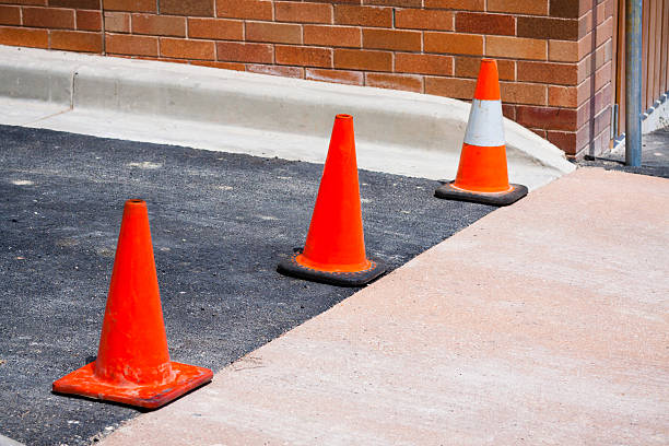 istock Three red traffic cones on the road 174948401