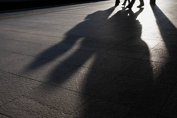 istock Shadow of two businessmen. 174948534