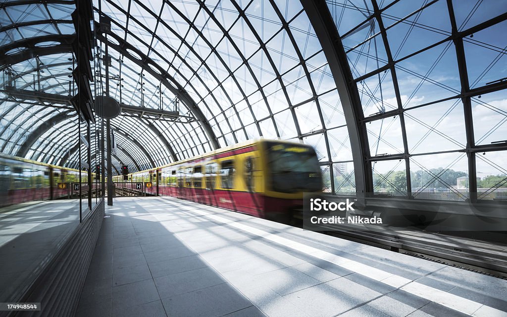 Train is leaving in Berlin "Train leaving the Stationmotion blurBerlin, Germany" Architecture Stock Photo