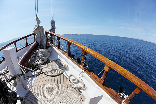 istock bow with circular rolled up mooring rope of sailing ship 174948582