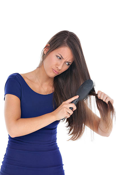 istock woman hair brush 174949021