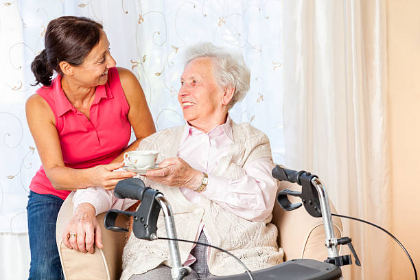 istock Senior woman and caregiver 174949183