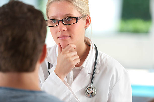 istock Doctor listening to a patient 174949293