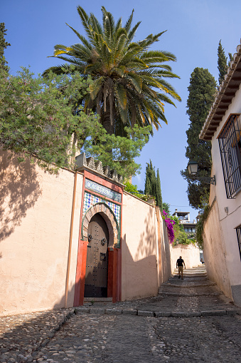 Street of Albaicín district in Granada, Spain
