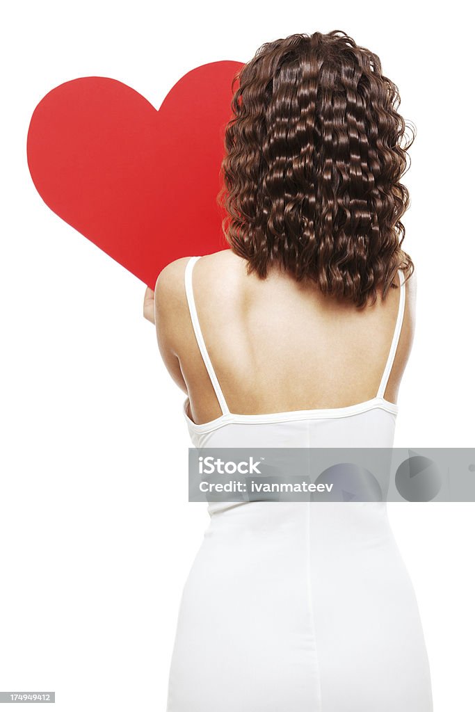 Giovane donna con cuore di carta rossa - Foto stock royalty-free di Adulto