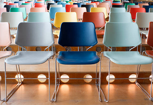 istock colorful empty chairs in theater 174949434