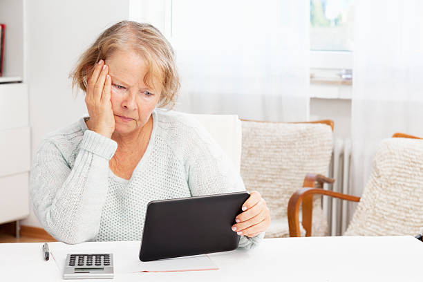 istock financal worries senior woman calculation 174949470