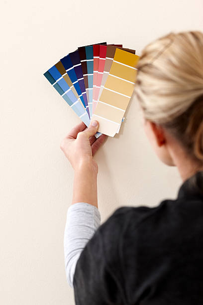 istock Woman selecting color for wall 174949514