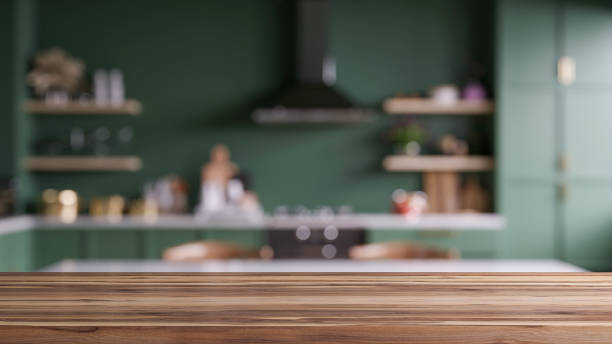 istock Wooden table top on blur kitchen room background 1749495731
