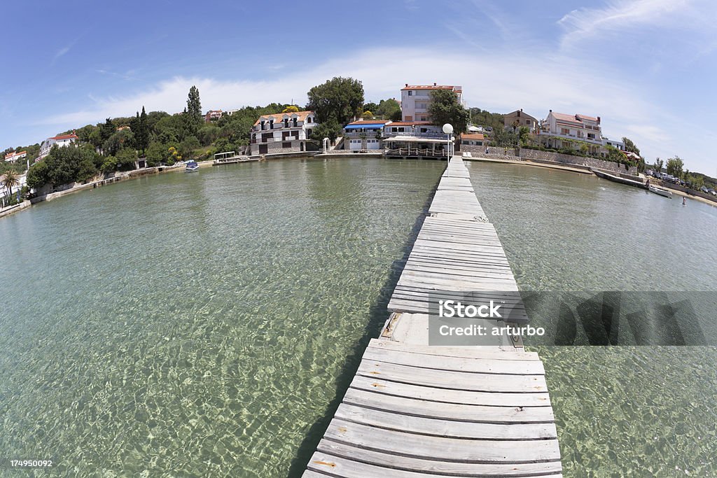 empty sailing boat jetty and mediterranean ocean view Krk Croatia empty sailing boat jetty and mediterranean ocean view  Krk Croatia Beach Stock Photo