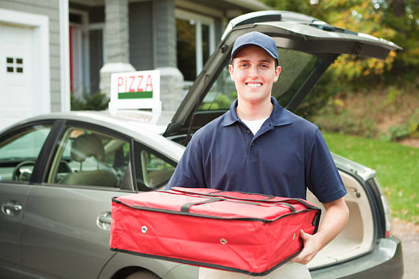 Happy Smiling Pizza Delivery Man with Package Hz