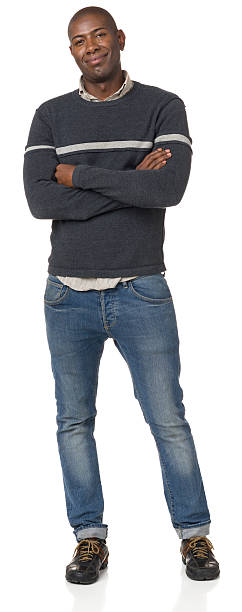 istock Relaxed Young Man Standing With Arms Crossed 174950575