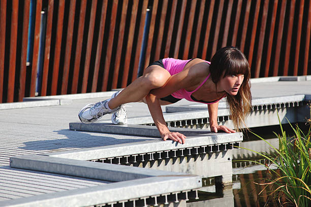 Woman Does Yoga Crow stock photo