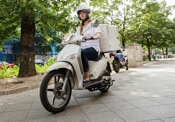 istock Delivering fast food on Motor scooter 174951878