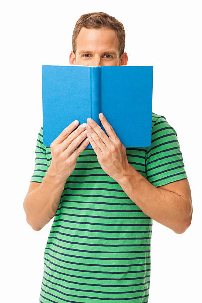 istock Man Covering Face With Book - Isolated 174951913