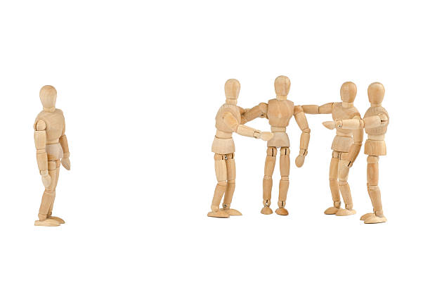 istock Wooden mannequins bullying another 174952051