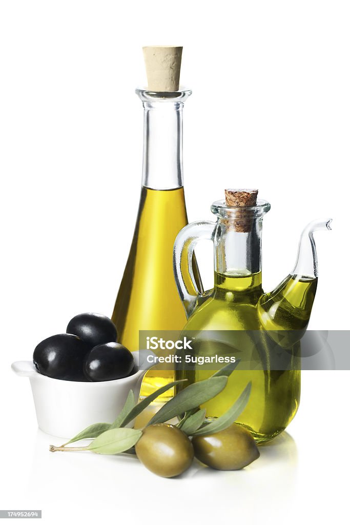 Bottles with two kinds olive oil Bottles with two kinds olive oil isolated Mediterranean Sea Stock Photo