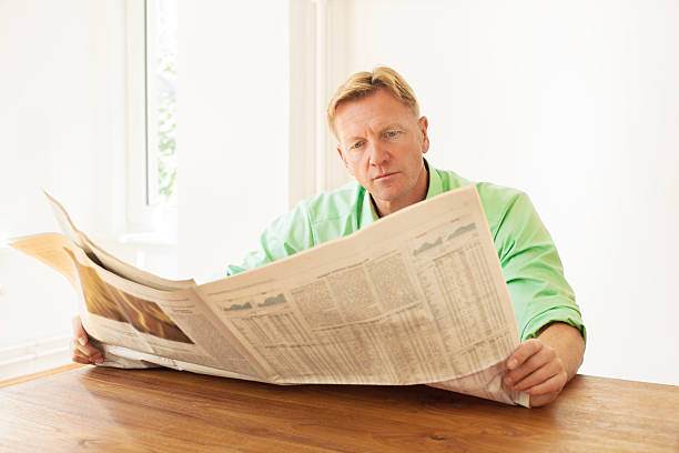 istock Mature adult reading 174952705