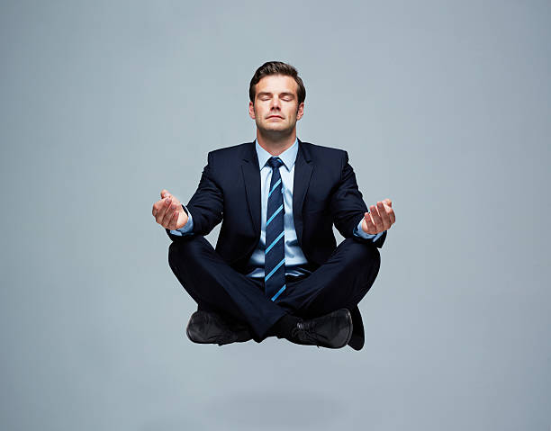 ライジング上の - zen like meditating yoga business ストックフォトと画像