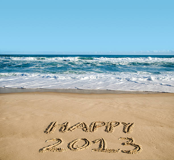 nowy rok przy plaży 2013 r. - 2013 beach sand new years eve zdjęcia i obrazy z banku zdjęć