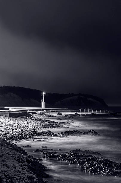 istock Windy winter seascape at night 174953008