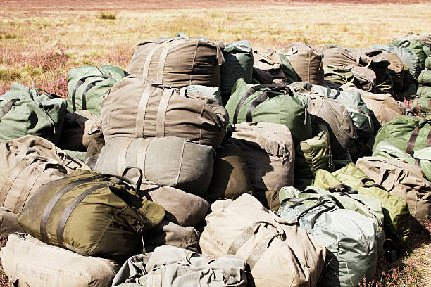 Airborne Operation Market Garden "Remembering of the world war ll Operation Market Garden the largest airborne landing operation ever was a failure that cost thousands of lives. More than 12,000 men, (Britiish, American and Poles) were dropped near Ede, but only 2,200 made it back home. The image depicting a stack of  parachuts used on the remembering at 22 september 2012. The remembering is a yearly event in Ede, Netherlands" operation market garden stock pictures, royalty-free photos & images