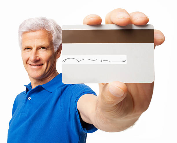 Senior Man Holding Credit Card - Isolated