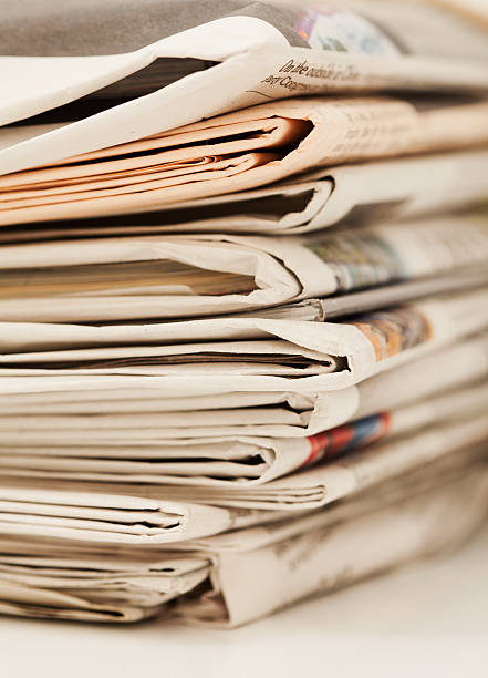 istock Pile Of Newspapers 174953418