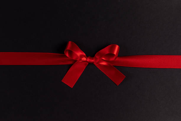 istock Shiny red satin ribbon bow 1749534204