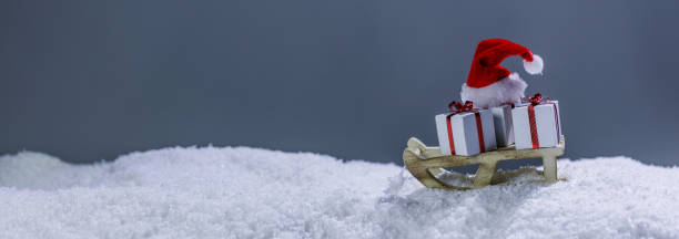 istock Christmas gifts on sled on snow 1749534250