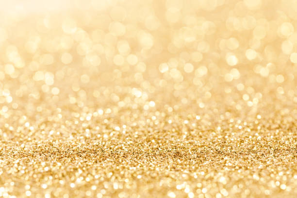 istock Shiny golden lights background 1749534274