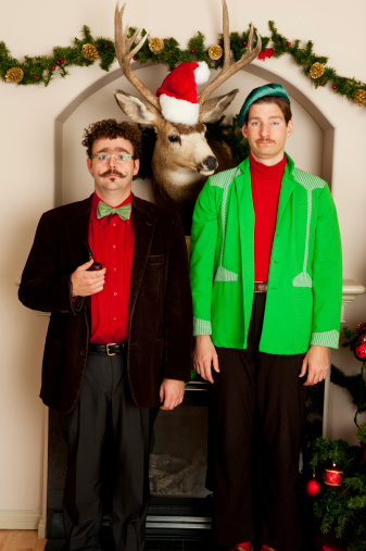 An awkward looking male couple with mustaches.My Awkward Christmas Lightbox