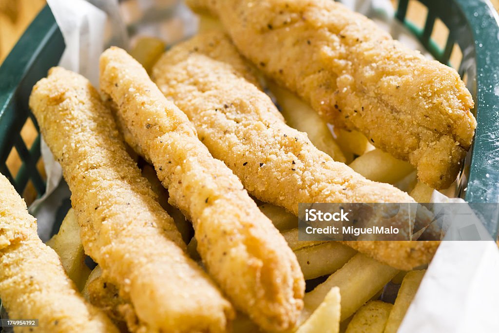 Fischstäbchen mit Pommes frites - Lizenzfrei Beleuchtet Stock-Foto