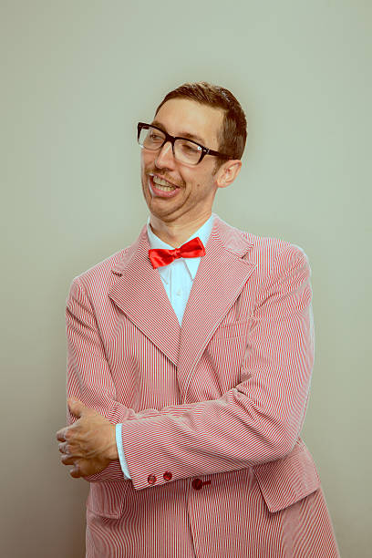 istock Retro fancy dressed Nerd with bow tie and glasses 174954467