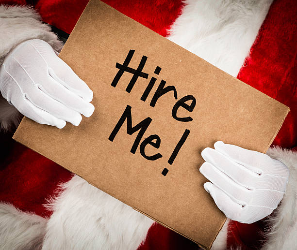 istock Santa with Hire Me Sign 174954745