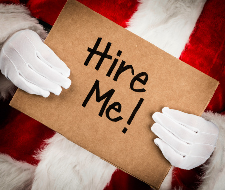 Santa with Hire Me sign