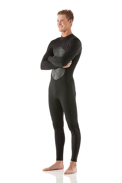 istock Smiling male surfer standing with his arms crossed 174955335