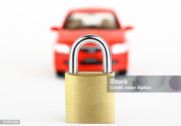 Lock In Front Of Blurred Red Car Stock Photo - Download Image Now - Abstract, Burglar Alarm, Business